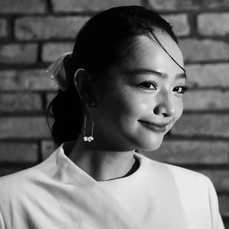 Young Vietnamese woman in white dress